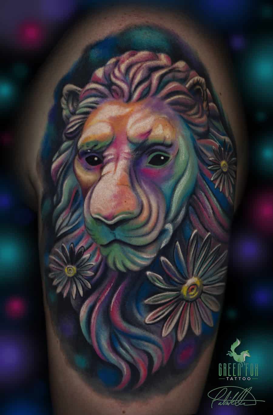 dental-emu431: colorful lion tattoo