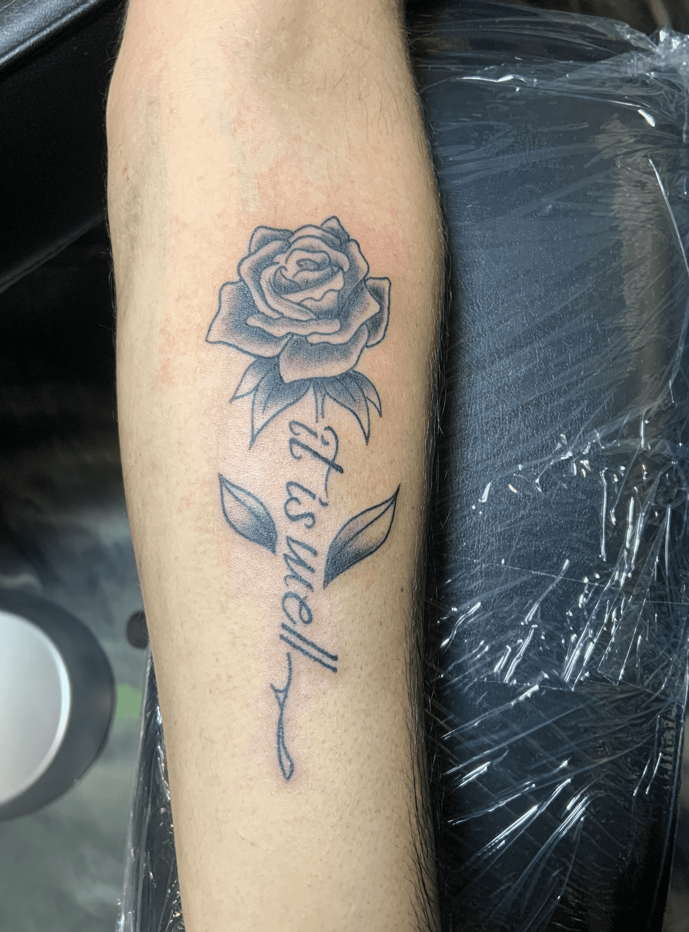 rose lettering tattoo