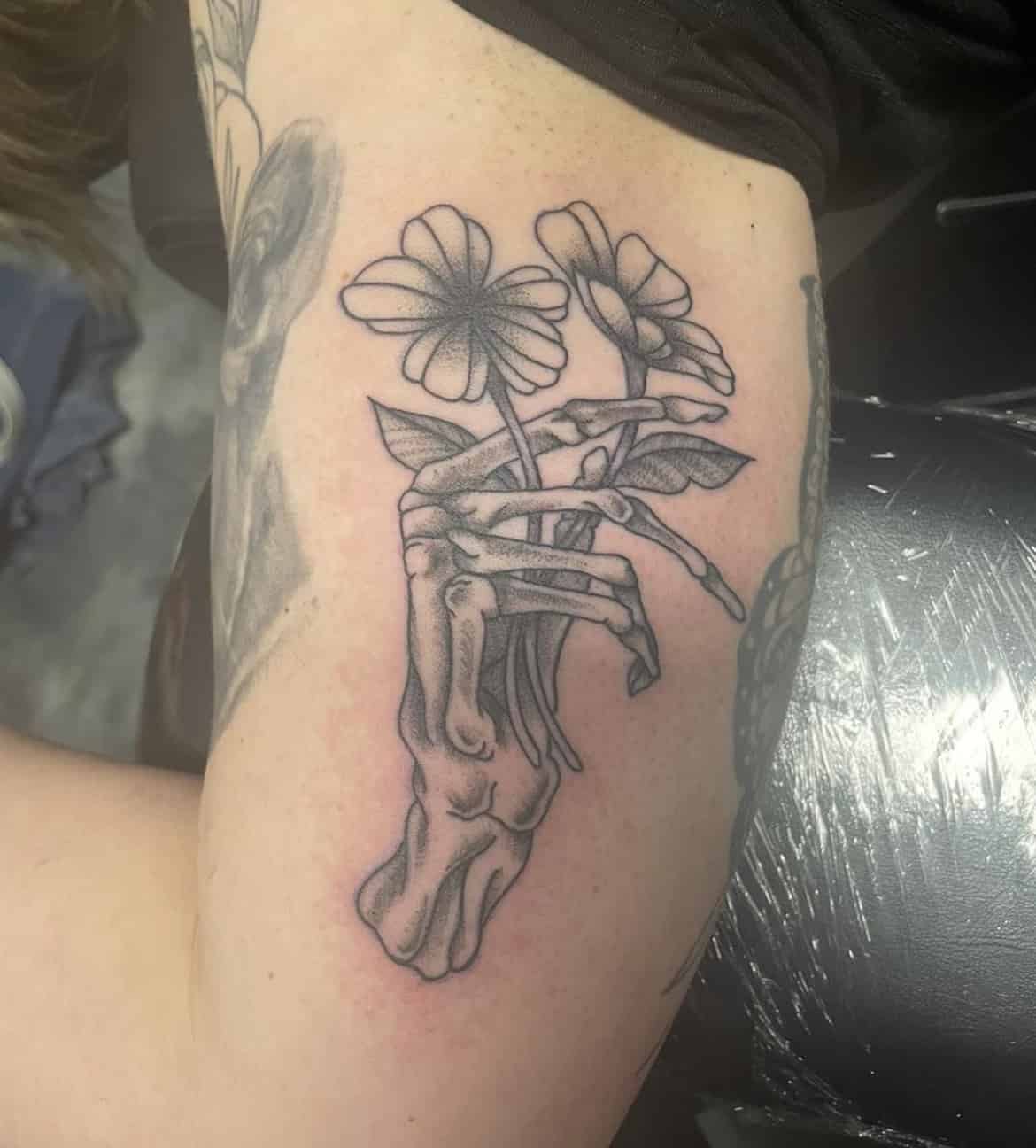 skull floral tattoo