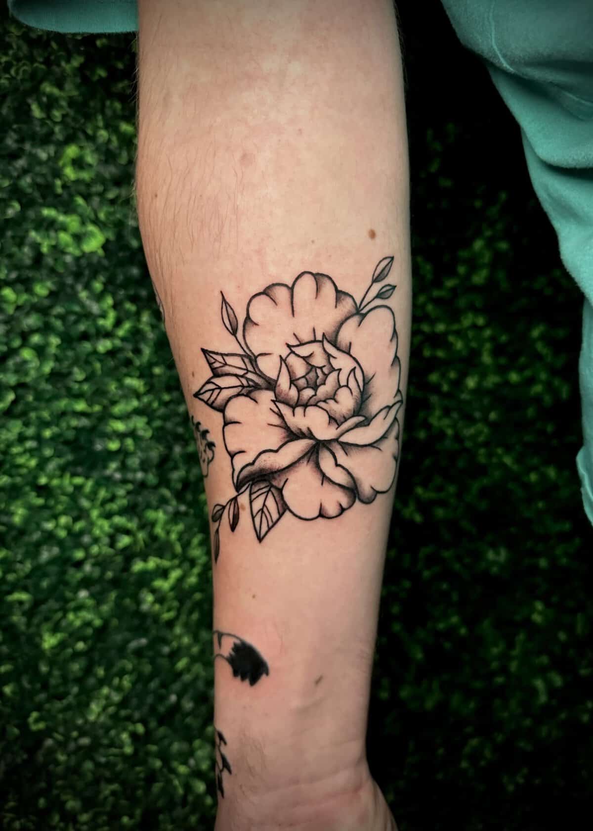 fine line floral tattoo