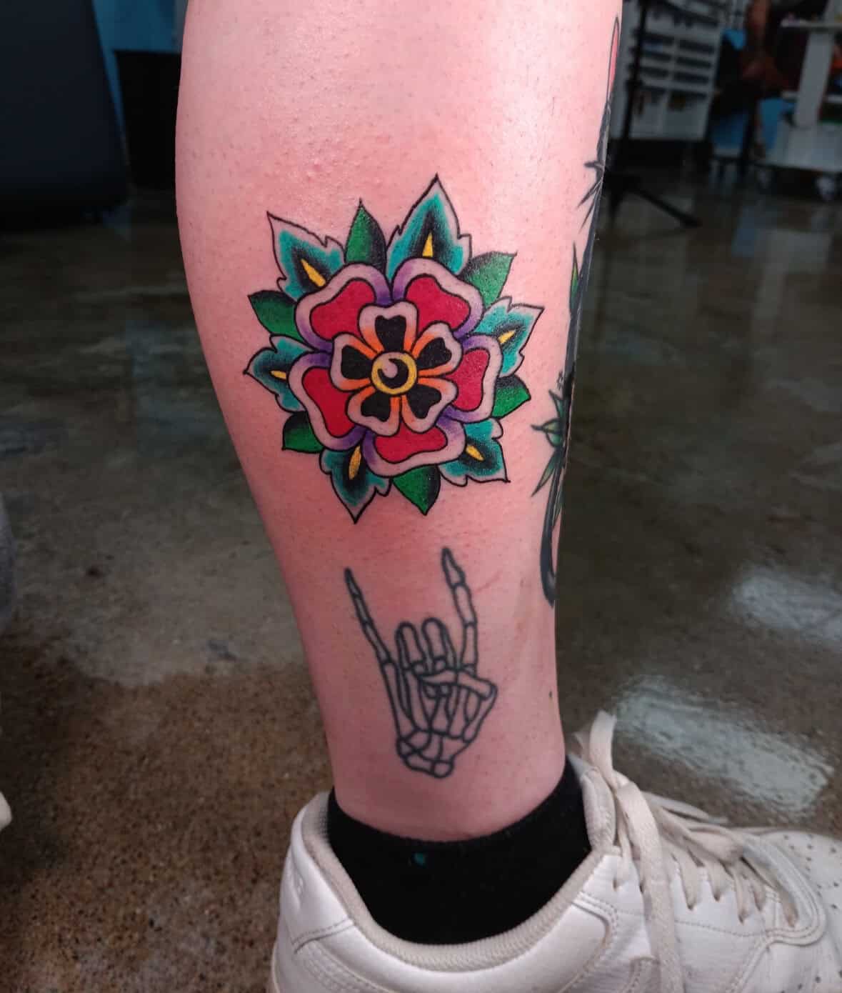 fine line floral tattoo