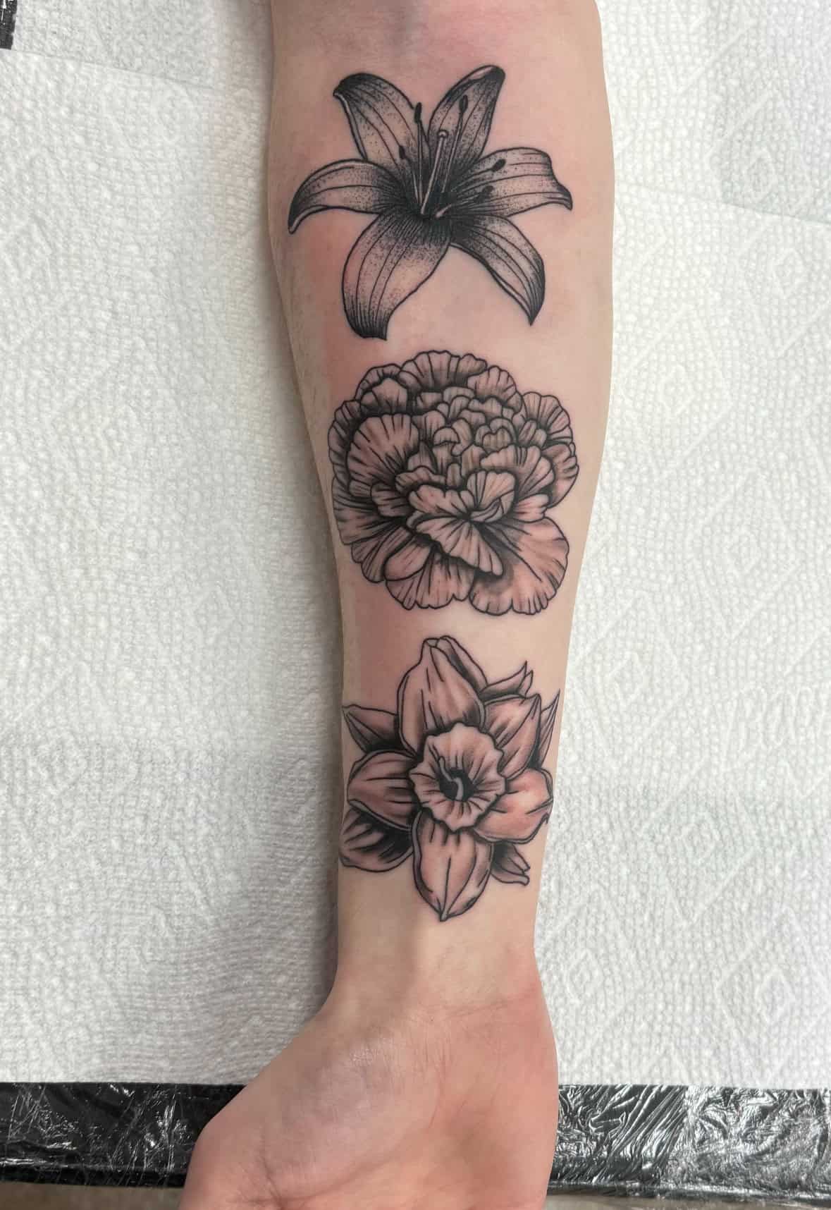 fine line floral tattoo