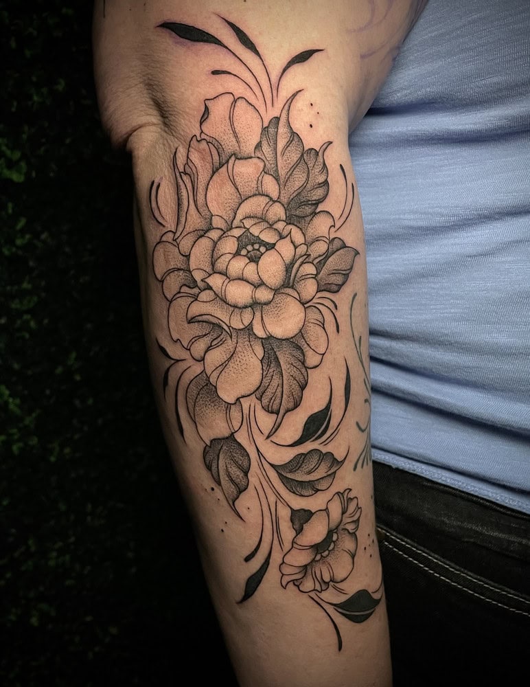 fine line flower tattoo